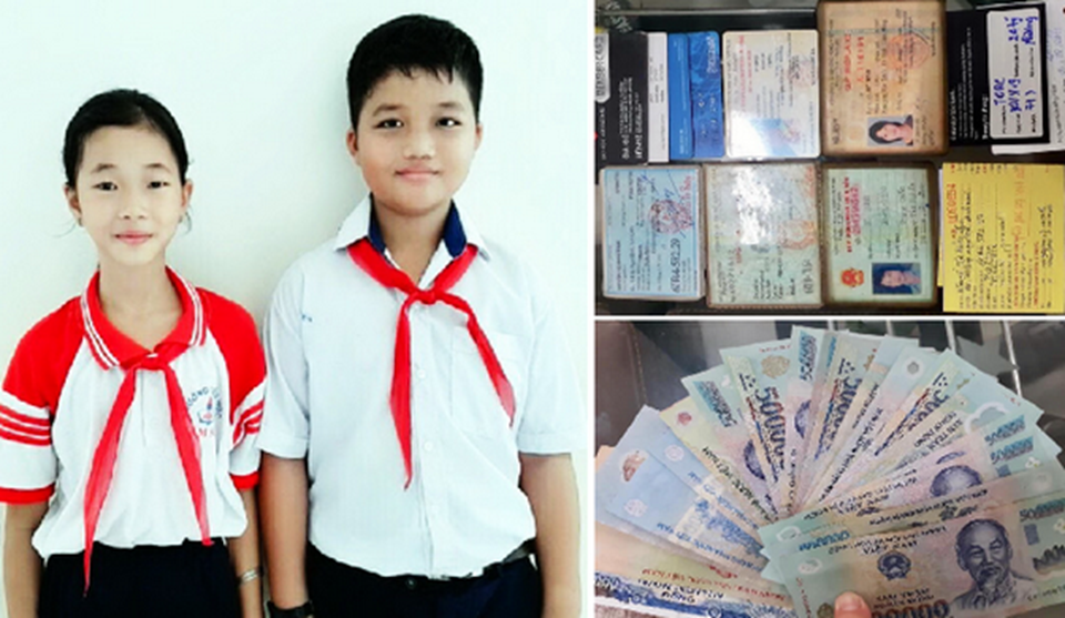Hai em học sinh có hành động đẹp. Ảnh: Báo Đồng Nai Hai em học sinh có hành động đẹp. Ảnh: Báo Đồng Nai