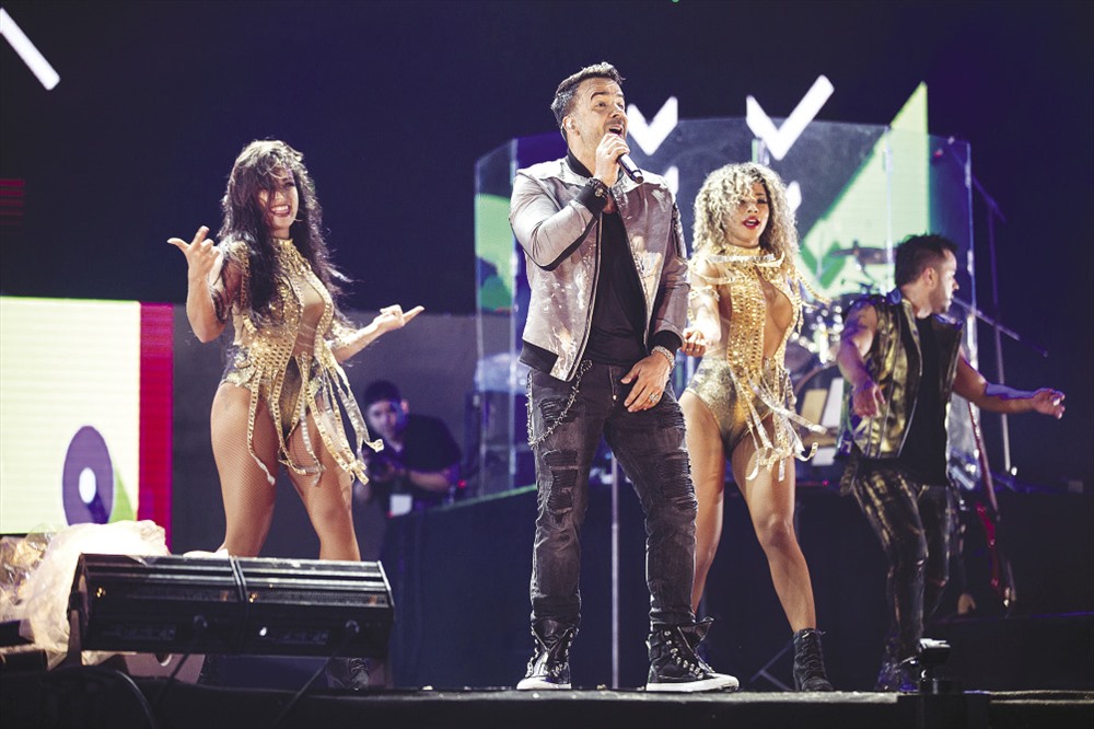 Luis Fonsi- “nỗi ám ảnh” của nhà tổ chức vì điều kiện kỹ thuật nghiêm ngặt. Ảnh: KIM ĐIỀN